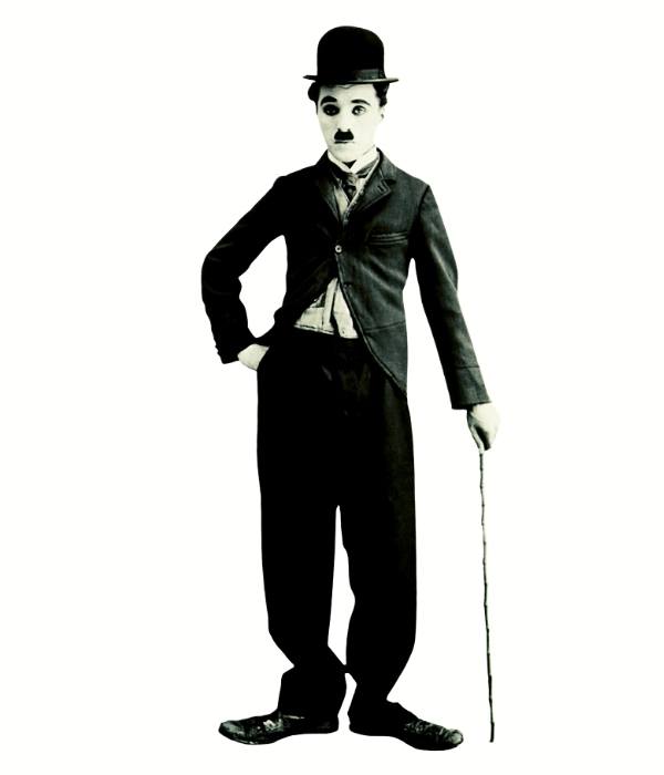 charlie chaplin standing with his stick